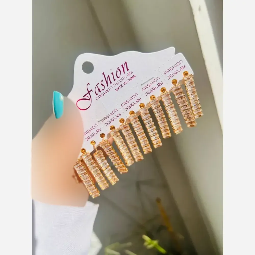 گوشواره دخترانه مدل تنیسیرنگ طلایی از جنس رادیوم