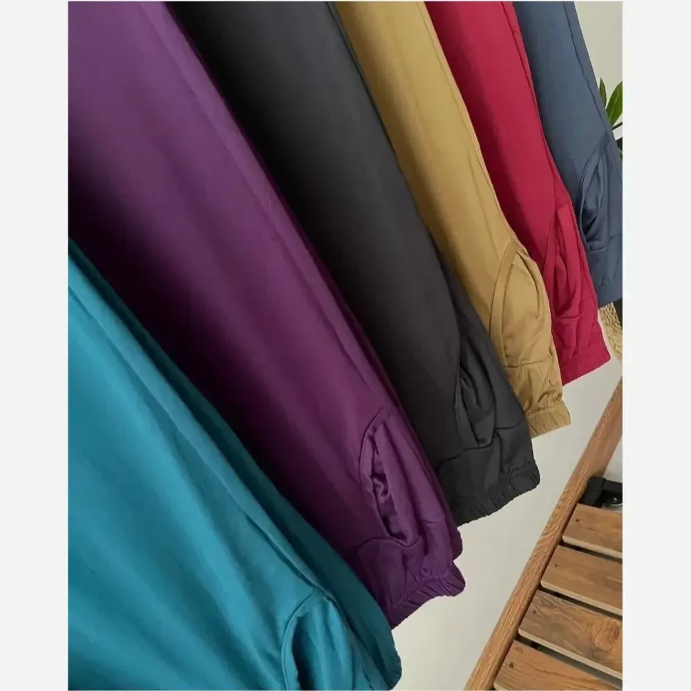 شلوار راحتی زنانه اسلش طرح گیاهی وارداتی قواره آزاد مچ دار سایز بزرگ