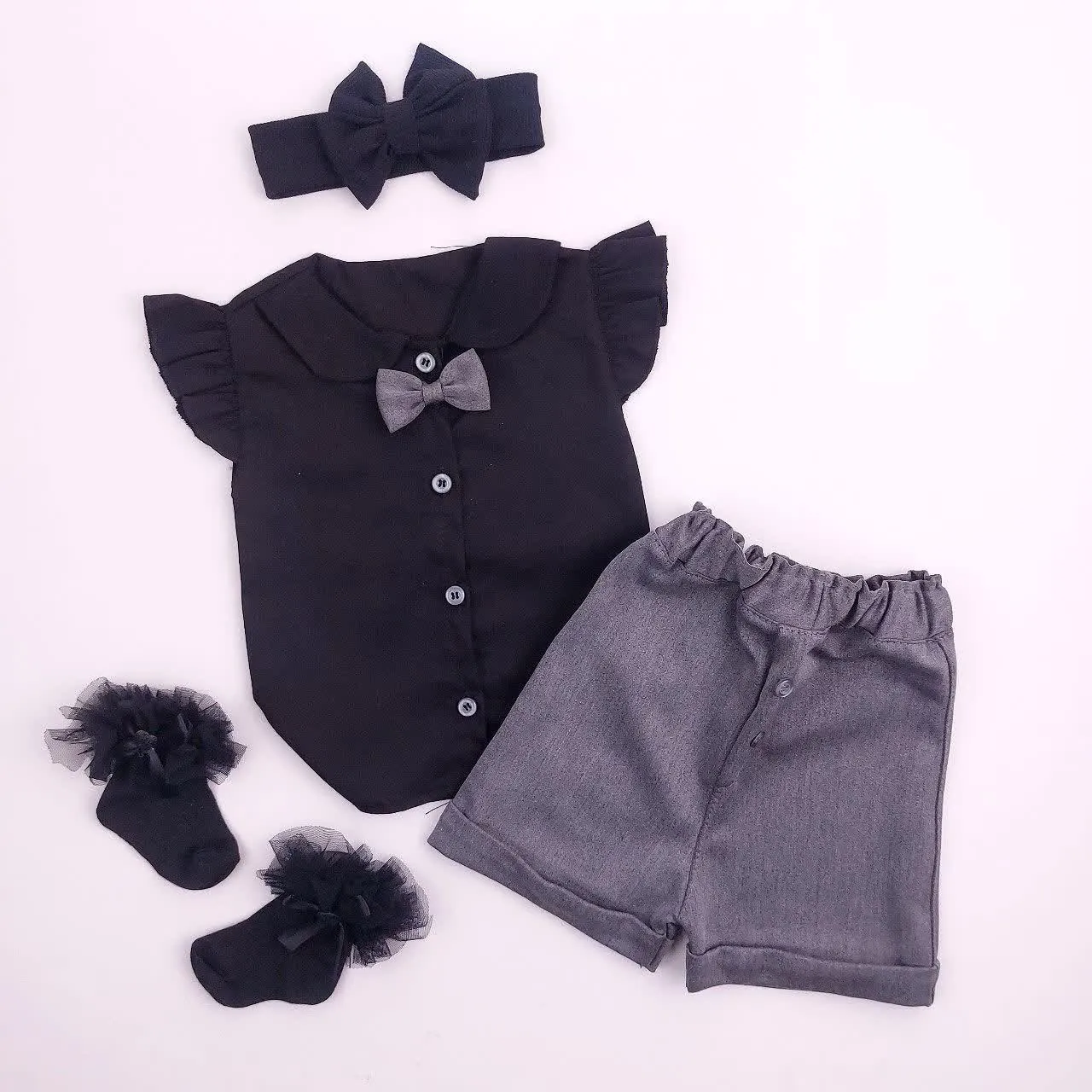 ست تاپ و شلوارک دخترانه محرمی نخی مشکی طرح بالک دار سایز 6 تا 36 ماه